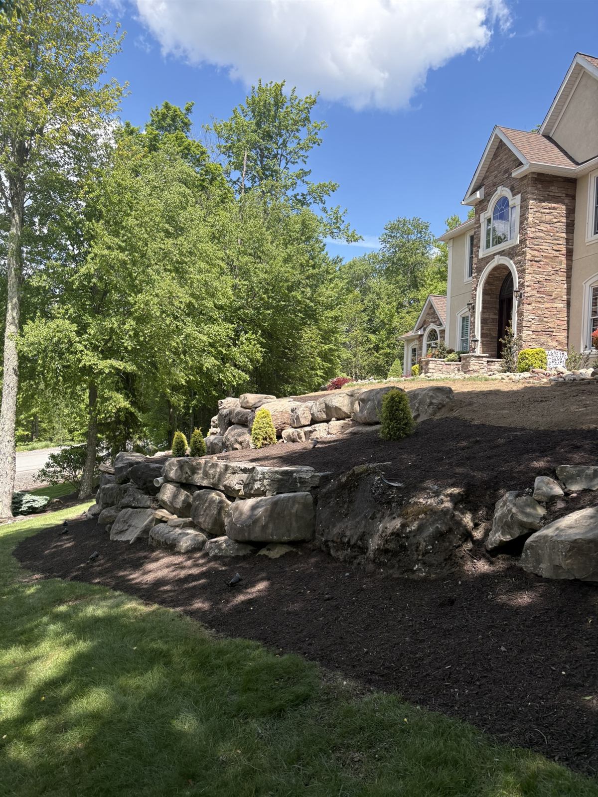 Boulder Retaining Wall Front Entrance